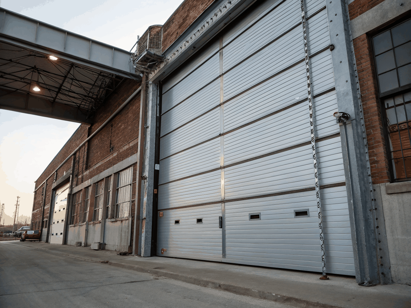 Commercial high clearance overhead doors in post frame structure